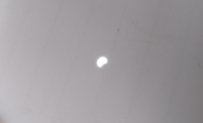 Pinhole projection showing a disk with the curved section removed